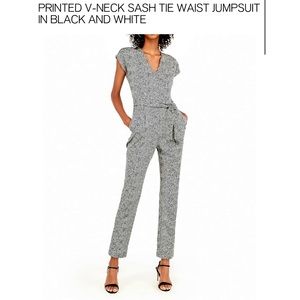 Slimming, sophisticated, and versatile v-neck jumpsuit with pockets!